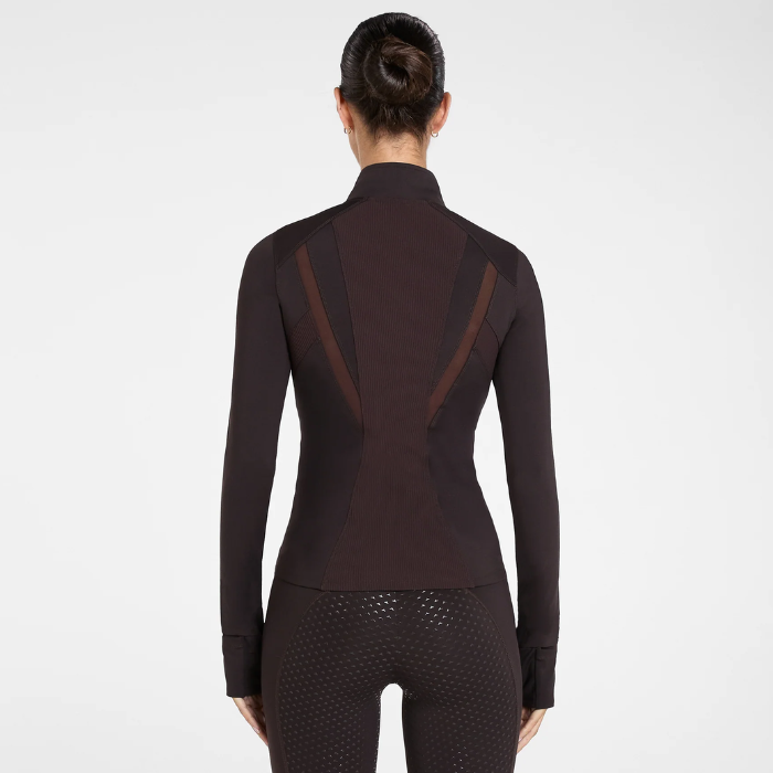 Aztec Diamond AW26 Core Fitted Jacket Variant Espresso. A woman viewed from the back wearing a dark brown long-sleeve athletic top with sheer mesh side panels and matching dark perforated leggings, against a light grey studio background.