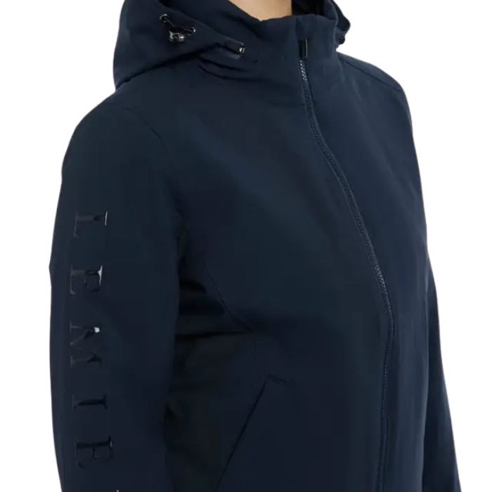 LeMieux AW26 Ladies Team Jacket Variant Colour Navy. A  close up of model wearing navy jacket on white background. 