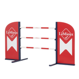 LeMieux Hobby Horse Jump Variant Chilli. A LeMieux horse jump with red and white striped horizontal bars supported by two red and navy blue curved panels with the LeMieux logo, shown on a plain white background.