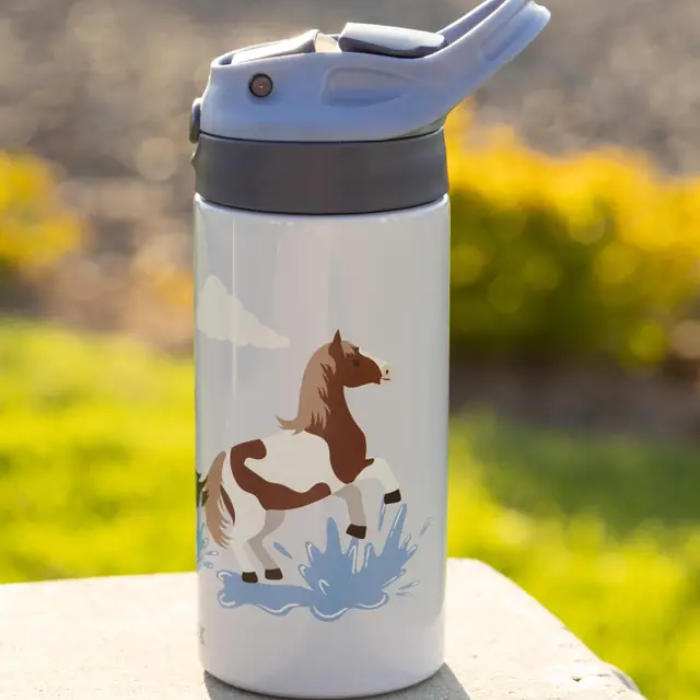 White water bottle with a horse design on a natural background