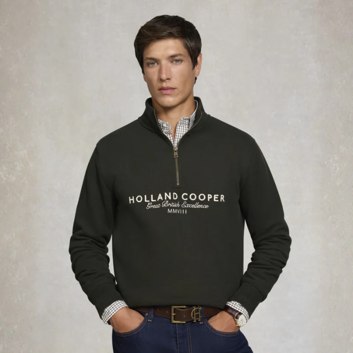 Male with Green zip sweater with Holland Cooper branding