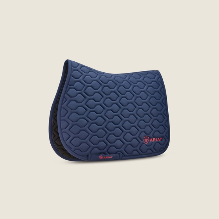 Ariat Evolve Saddle Pad Varient Navy. Navy saddle pad with red 'Ariat' detailing on a beige background.