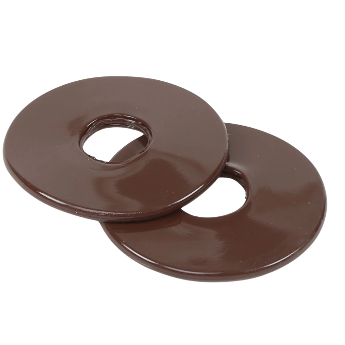 Two brown rubber bit guards on a white background