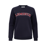 LeMieux AW26 Vida Varsity Crew Neck Sweat Variant Colour Navy.
A navy blue crewneck sweatshirt with 'LEMIEUX' embroidered in red across the chest, displayed on a clean white background.
