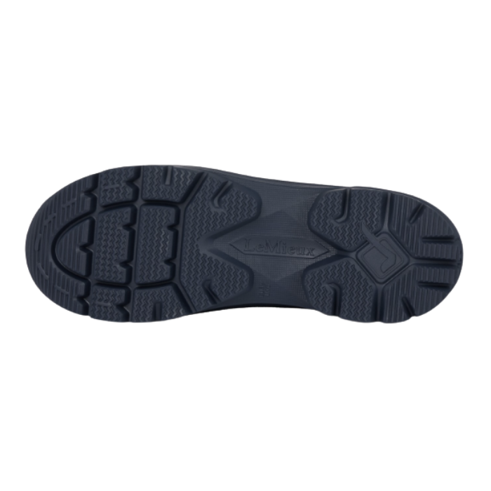 LeMieux AW26 Bramshaw Chelsea Welly Varient Navy. The black rubber outsole of a welly, showing the textured tread pattern and embossed LeMieux logo, photographed from a top-down view on a white background.