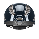 Navy riding helmet with silver accents and 'uvex' branding on a white background