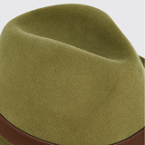Dubarry Gallagher Hat Variant Olive. Close-up of a felt fedora hat in olive green with a brown leather band visible along the lower edge, against a light gray background.