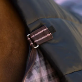 Close up of a horse rug with a detachable neck. 