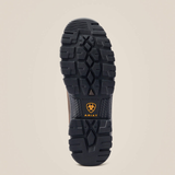 The treaded black rubber outsole of an Ariat boot, shown from a top-down view against a light beige background.