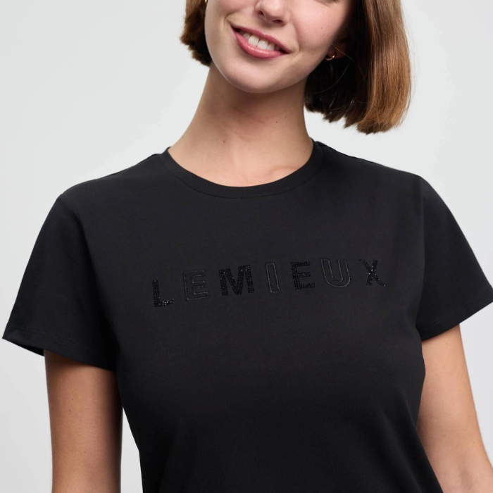 Person wearing a black t-shirt with 'LEMIEUX' branding on a plain background