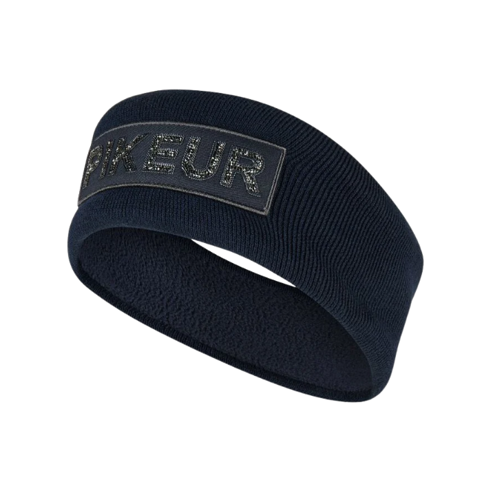 Pikeur AW26 Cotton Headband Variant NightBlue. A dark navy blue athletic headband with a textured knit exterior and a soft fleece interior. It features a rectangular patch on the front with the brand name 'PIKEUR' in a glittery silver font outlined in black.