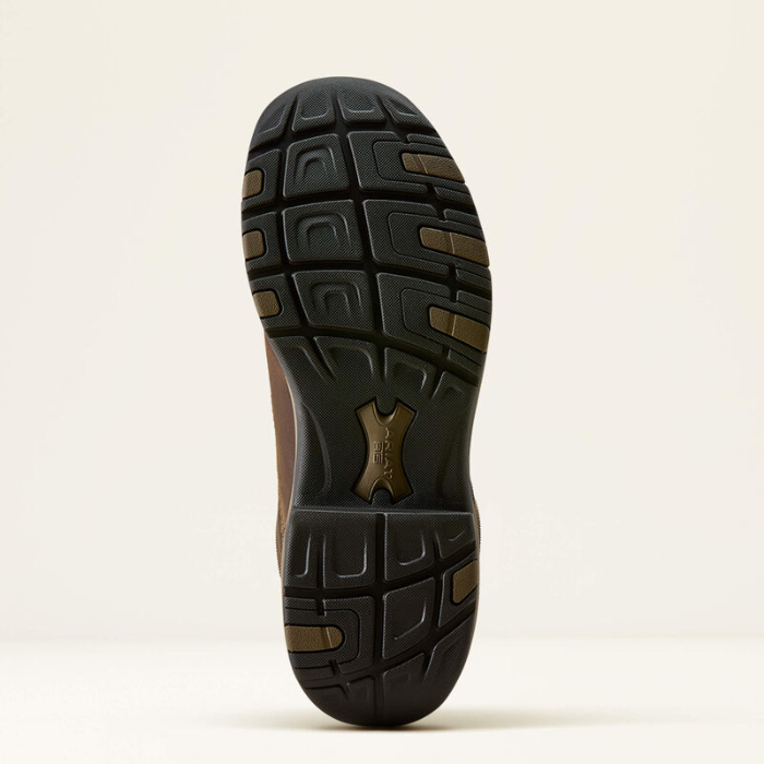 Ariat Ladies Terrain Trek H20 Variant Dark Chocolate. Black sole of a shoe with tread pattern on a white background.