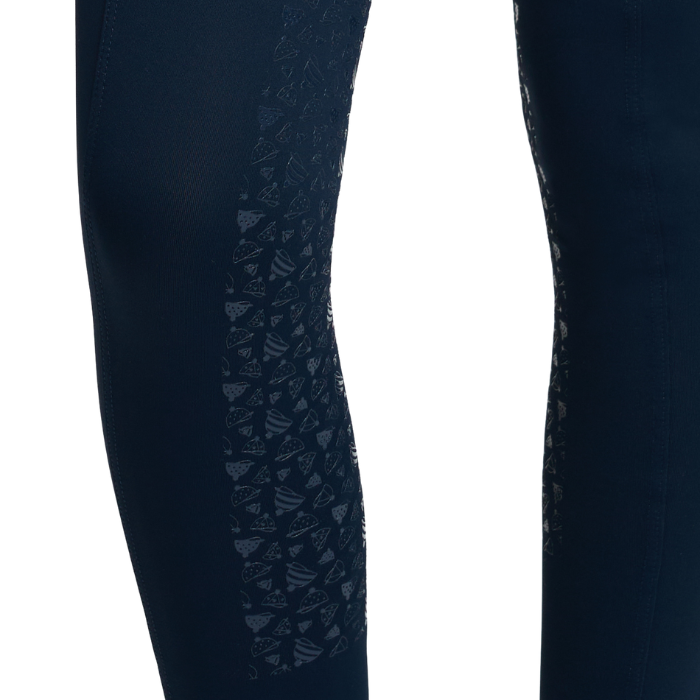 LeMieux AW26 Mini Pull Ons Varient Navy/Aloe. Close-up of dark navy athletic leggings with a tonal geometric pattern panel on the side, shown against a plain white background.