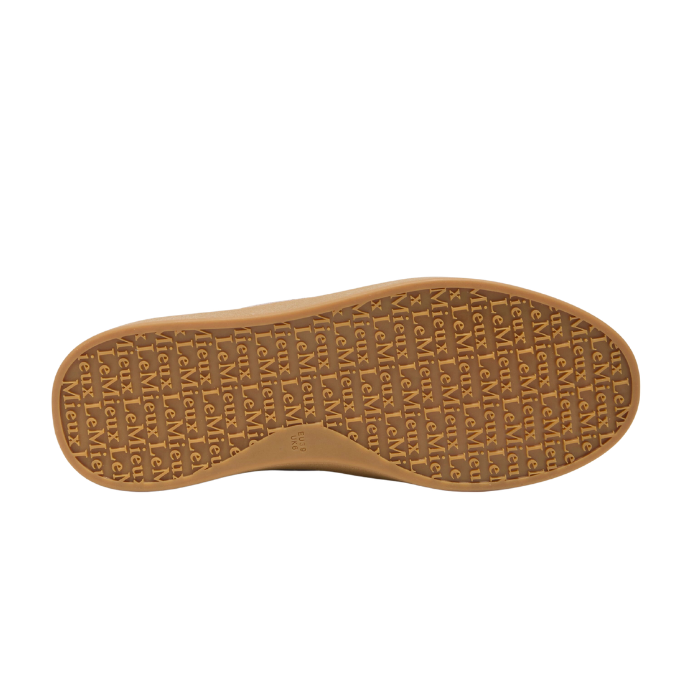 Brown shoe sole with textured pattern on a white background