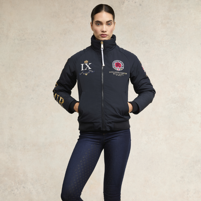 Woman styles the Holland Cooper Team HC Jacket in Navy