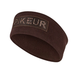 Pikeur AW26 Cotton Headband Variant Chocolate Brown. A dark brown ribbed knit headband with a rectangular patch on the front displaying the brand name 'PIKEUR' in raised letters.