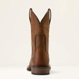 Ariat Men's Western Big Rig Wide Square Toe Cowboy Boot Variant Colour Distressed Brown. Western squared toe boot in brown with decorative stiching on the side on light cream background.