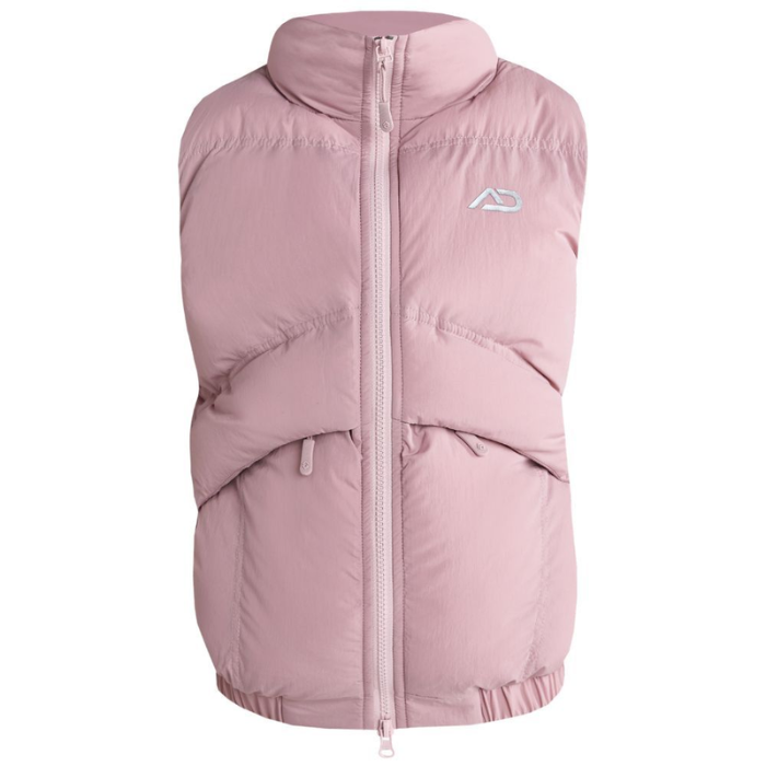 A light pink puffer vest with a full front zipper, high collar, and a small white stylized logo on the left chest, shown against a plain white background.