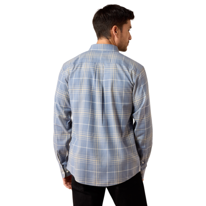 Ariat Men's Clement Long Sleeve Shirt Varient Soft Blue Plaid. A man shown from the back wearing a light blue plaid button-down shirt with thin white and yellow lines, paired with black pants, against a plain white background.