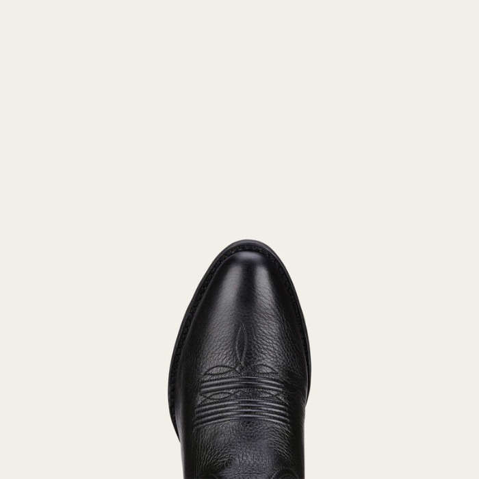Ariat Ladies Heritage R Toe Western Boot Variant Colour Black Deertan. the toe of a Western boot with decorative stitching with R shaped toe on light cream background. 