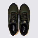 A pair of dark olive green and black trail  shoes with orange accents, shown from a top-down view on a light gray background. The brand 'dubarry' is clearly visible on the tongue and insole.