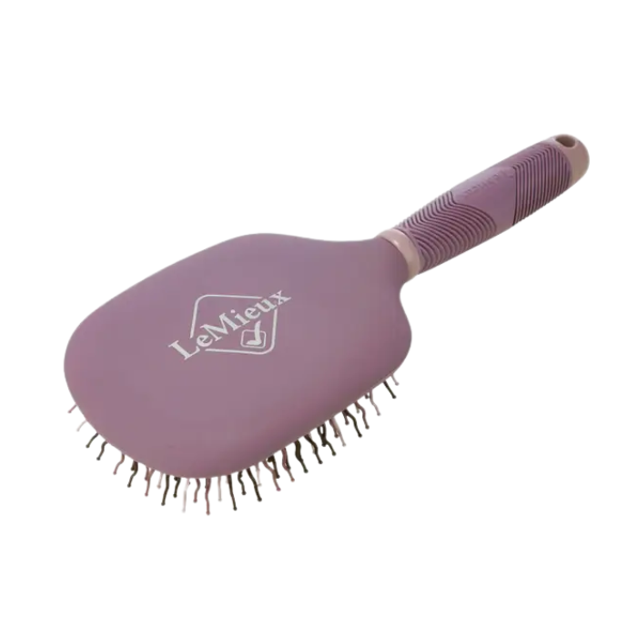 Purple hairbrush with 'LeMieux' branding on a white background