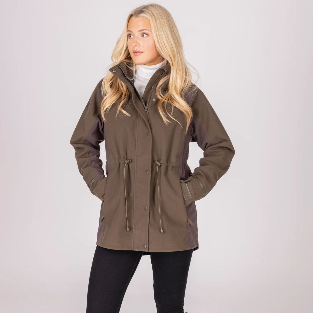 Woman wearing a brown jacket on a white background