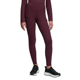 LeMieux AW26 Young Rider Orla Ribbed Pull Ons Varient Bramble. A model wearing high-waisted, long-sleeve athletic leggings in a deep burgundy color, paired with black sneakers, shown against a plain white background.
