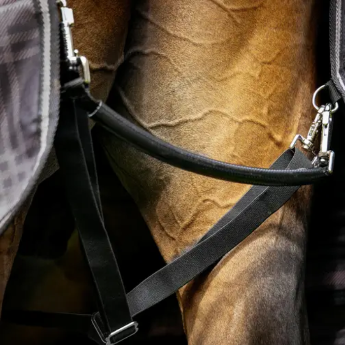 Close-up of a horse's leg wearing a PVC fillet strap.