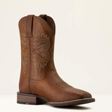Ariat Men's Western Big Rig Wide Square Toe Cowboy Boot Variant Colour Distressed Brown. Western squared toe boot in brown with decorative stiching on the side on light cream background.