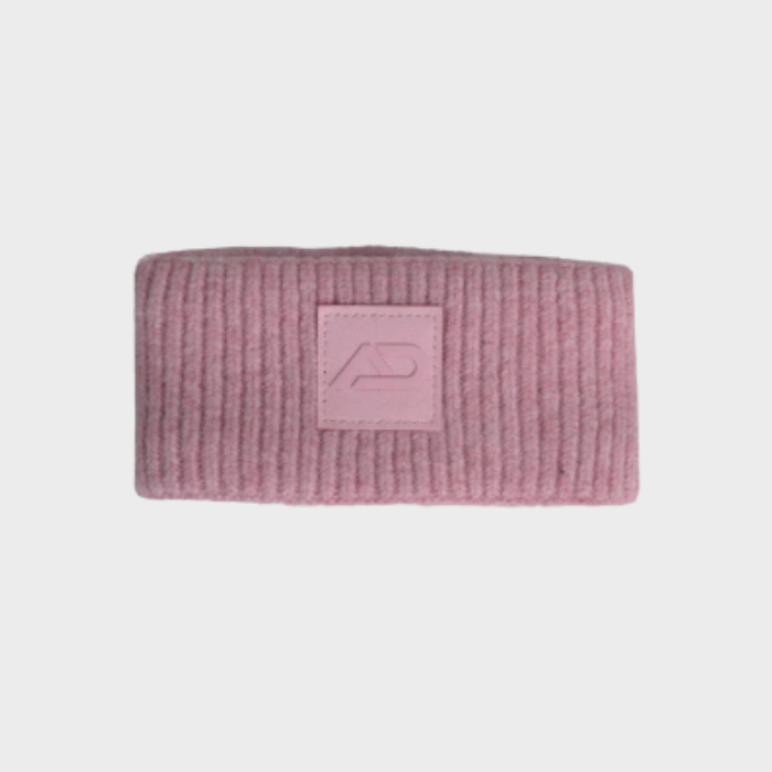 Pink knitted headband with a logo on a light grey background