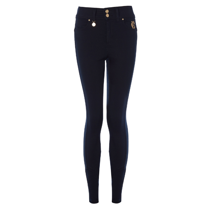 Holland Cooper Jodhpur Jean Variant Ink Navy. A pair of dark navy blue skinny jeans with gold-tone hardware, including a decorative gold tag on the right pocket and gold buttons at the waistband, shown against a plain white background.
