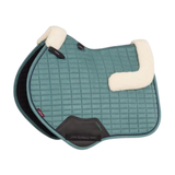 LeMieux AW26 Merino+ Suede Classic Close Contact Square Varient Aloe. A quilted Aloe equestrian saddle pad with cream sherpa fleece padding on the underside and black leather accents, shown on a plain white background.