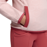 LeMieux AW26 Mini Maggie Heart Fleece Varient Petal. Close up of fleece pocket with red detailing and white hearts. 
