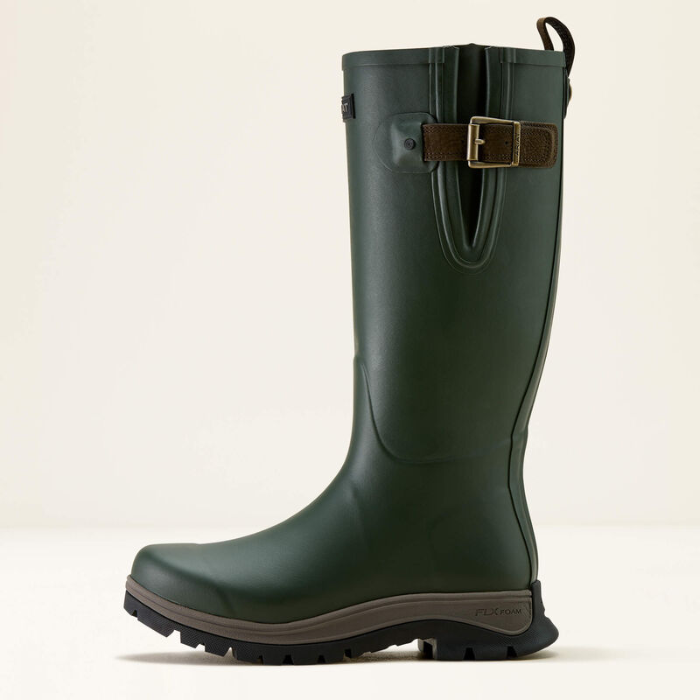 Green rubber boot with a buckle on a beige background