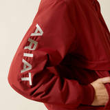 Brown jacket with 'Ariat' branding on a beige background