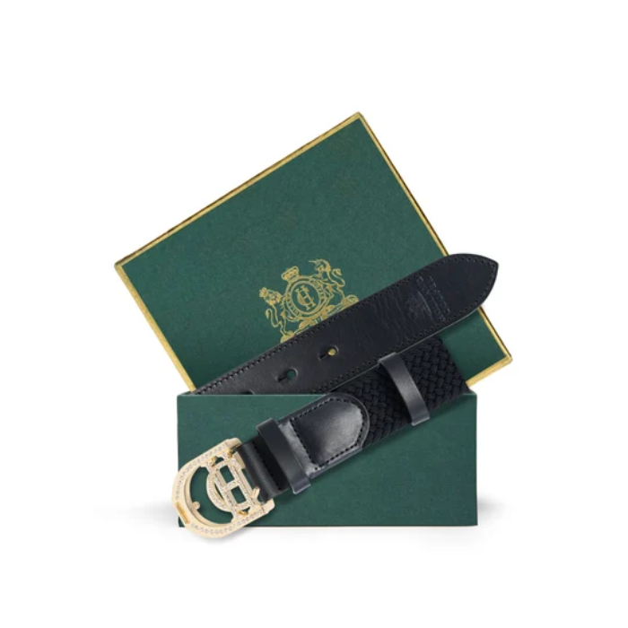 Holland Cooper Stirrup Heritage Belt Variant Colour Black Crystal. A black belt with CH gold buckle in a green box on white background. 