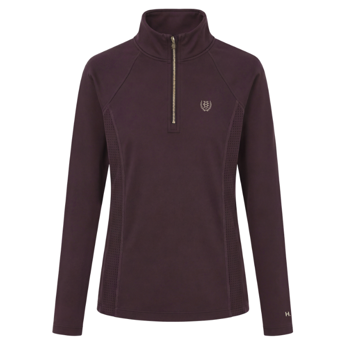 A Holland Cooper Cranborne Long Sleeve Base Layer Variant Colour Mulberry. 
A women's long-sleeve quarter-zip pullover in a deep plum purple color, featuring a small embroidered crest logo on the left chest and a small 'H' mark on the right sleeve cuff, shown against a plain white background.