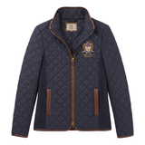 Holland Cooper Boughton Diamond Quilt Jacket Variant Colour Ink Navy.
A navy blue quilted jacket with brown corduroy trim, a front zipper, and a school crest embroidered on the left chest, shown against a plain white background.