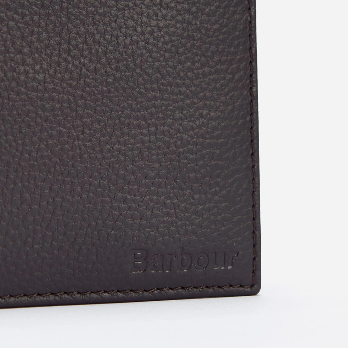 Close-up of a dark leather wallet with 'Barbour' branding on a light grey background