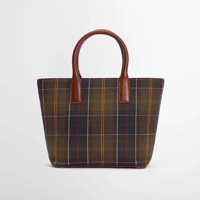 Tartan tote bag with brown handles on a light grey background
