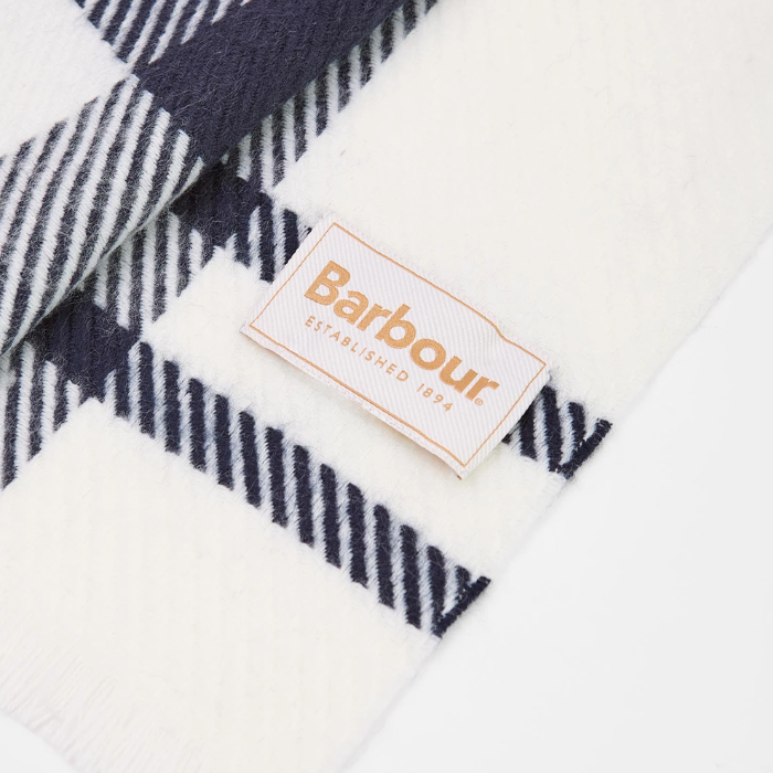 Close-up of a Barbour branded product with a checkered pattern