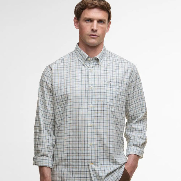 Man wearing a checked shirt on a white background