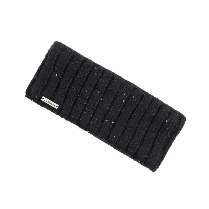 LeMieux AW26 Bernie Sequin Headband Variant Colour Black.
A black ribbed knit ear warmer headband with subtle silver glitter flecks, featuring a small white brand label that reads 'Le Mieux'.