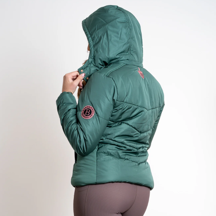 Green puffer jacket with a brand logo on a light grey background