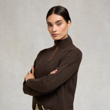 Holland Cooper Country Quarter Zip Knit Variant Colour Chocolate. A model wearing a brown knit sweater on grey background. 