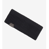 LeMieux AW26 Clara Rib Headband Variant Colouir Black.
A black ribbed knit headband with a small gray fabric brand tag, shown diagonally on a light gray background.