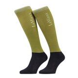 LeMieux AW26 Competition Socks 2 pack Variant Colour Gooseberry.
A pair of knee-high socks in gooseberry green with black toes and heels, featuring the brand name 'LeMieux' printed vertically in white on the upper leg, set against a plain white background.