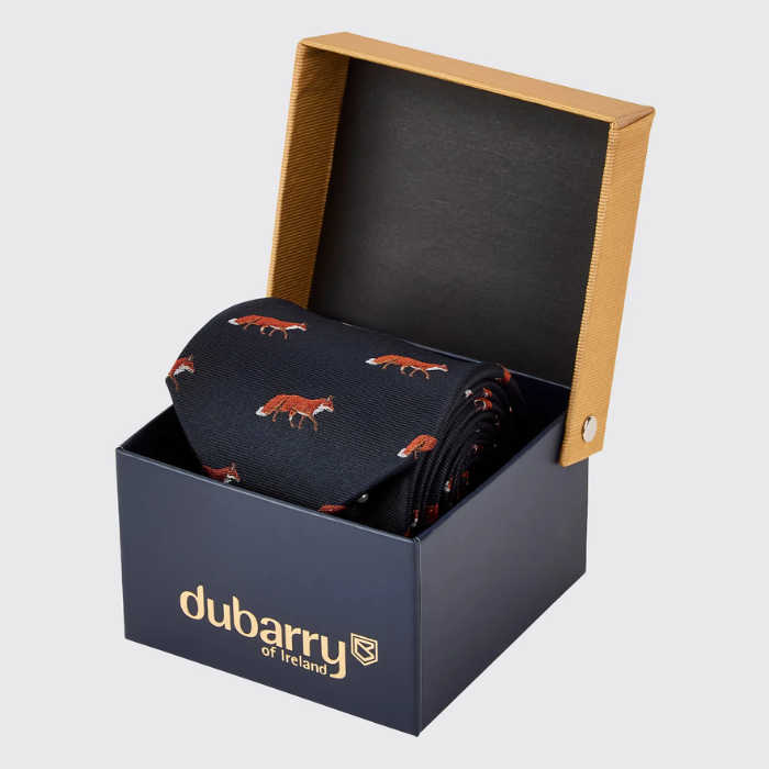 Navy tie with fox pattern in a 'Dubarry of Ireland' branded box on a light grey background