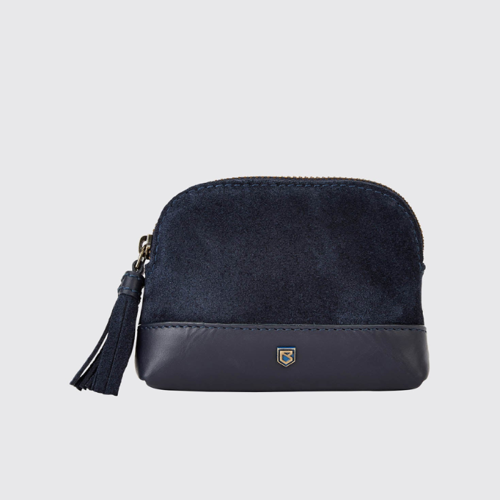 Navy blue coin purse with a tassel on a light grey background